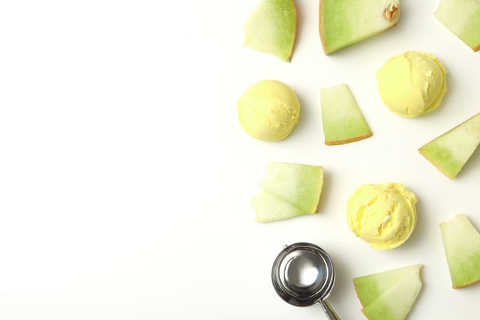 Ice cream scoops with slices of fresh melon