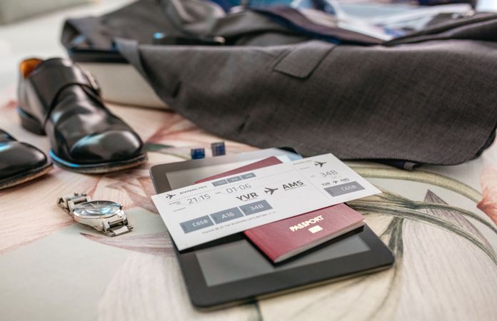 Business travel preparations with boarding pass