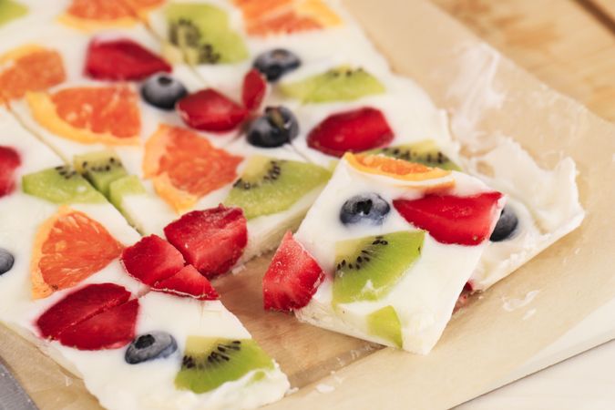 Frozen Yogurt Bark with Kiwi, Blueberry, Orange, and Strawberry.