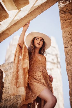 female in hat and lace dress