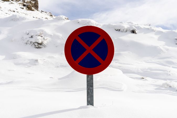 Snowed in road sign in Sierra Nevada mountains