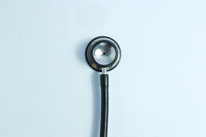 Stethoscope centered on plain table