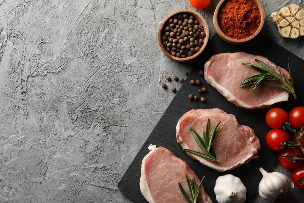Composition with raw meat and ingredients. Cooking steak concept
