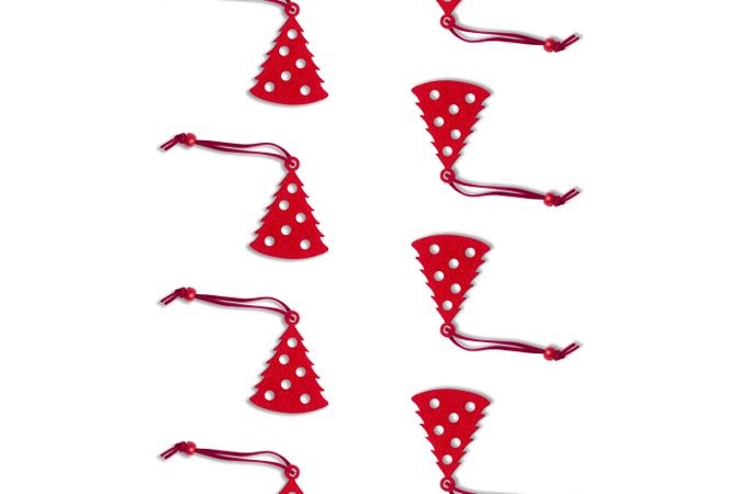 Red holiday decorations on light background