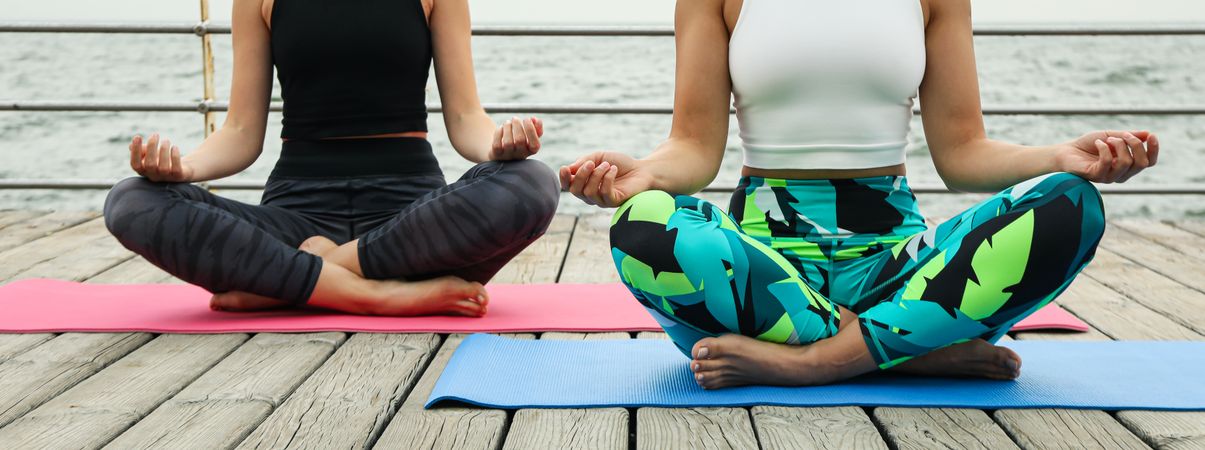 Yoga outdoor with young women, concept of health and body care