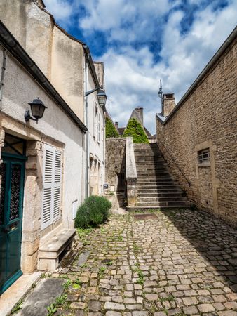 Empty streets of the medieval city of Beaune in Burgundy. The stormy sky