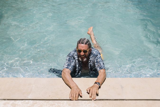 Mature man in swimming pool