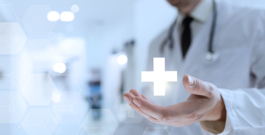 Doctor Reveals Medical Cross Icon in Palm