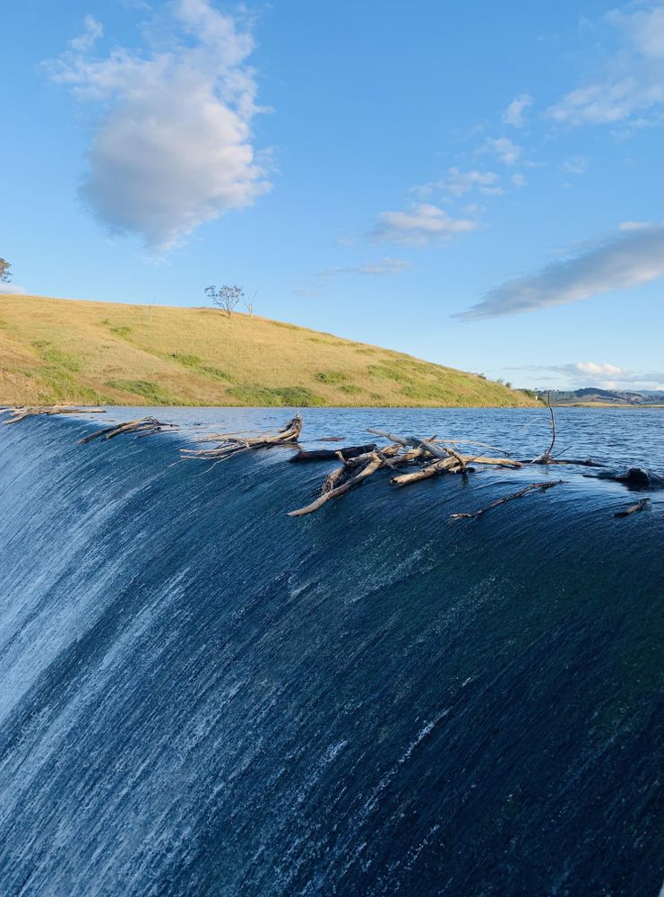Driftwood atop a waterfall
