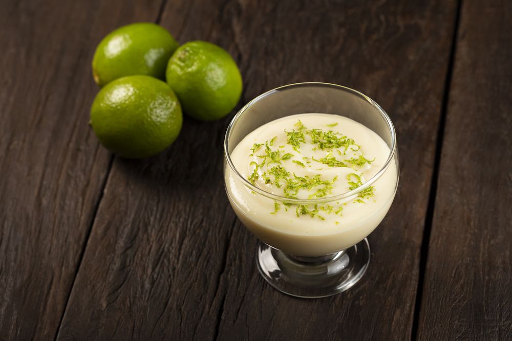Lemon mousse with lemon zest on top.