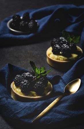 Homemade small cake with blackberries