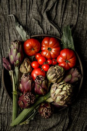 Assorted vegetables and napkins on table