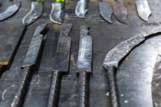 Different metal sharp tools at workbench