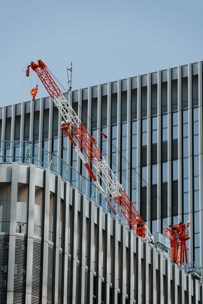 Crane at on a gray building