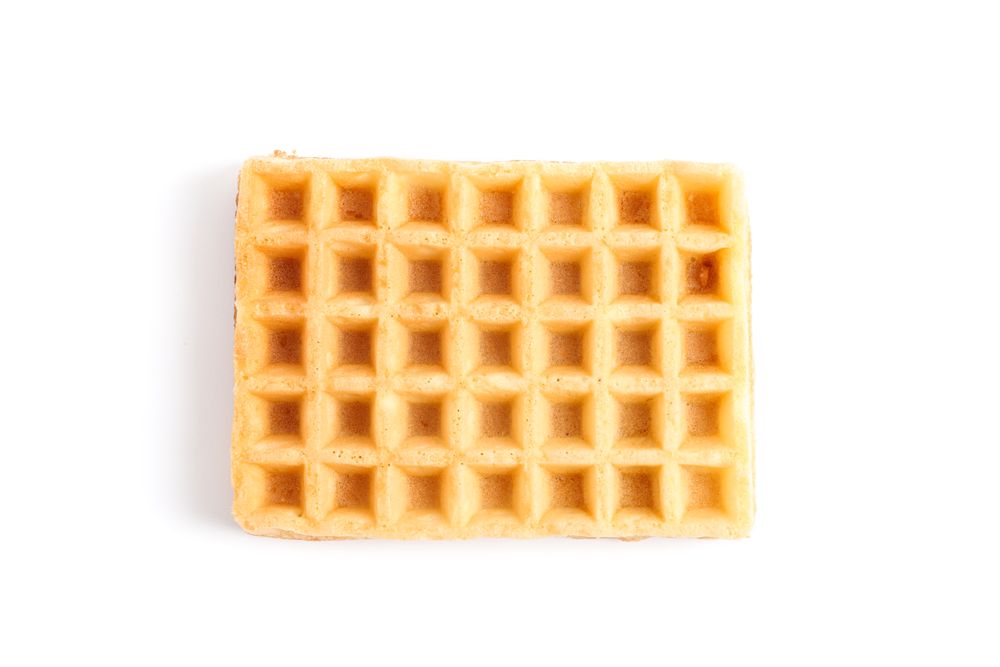 Sweet Belgian waffle isolated on blank background
