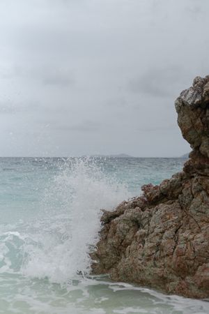 Wave crashing on rock