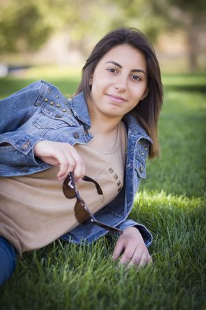 Iranian Young Woman Relaxing in Park