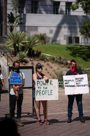 Los Angeles, CA, USA — June 16th, 2020: people stand with homemade signs at rally at city hall