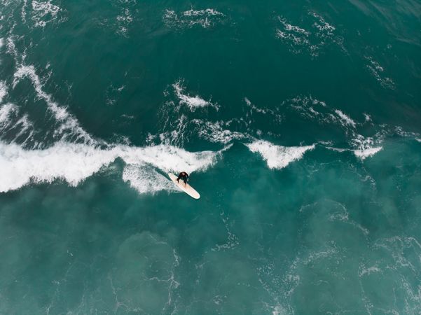 High angle view of person surfing in ocean