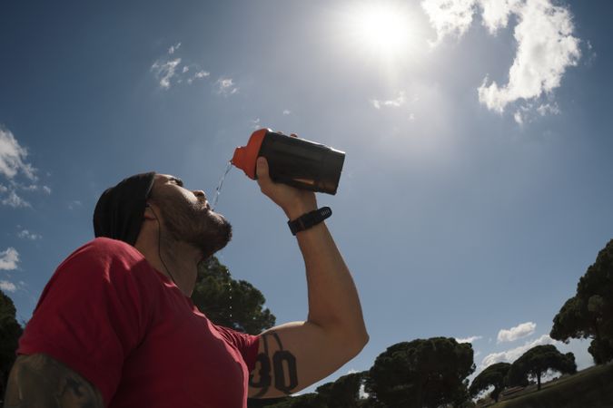Man drinking during training