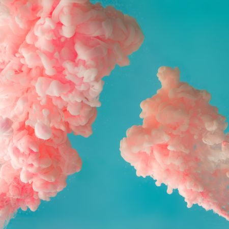 Cloud-like pastel pink color paint with teal background