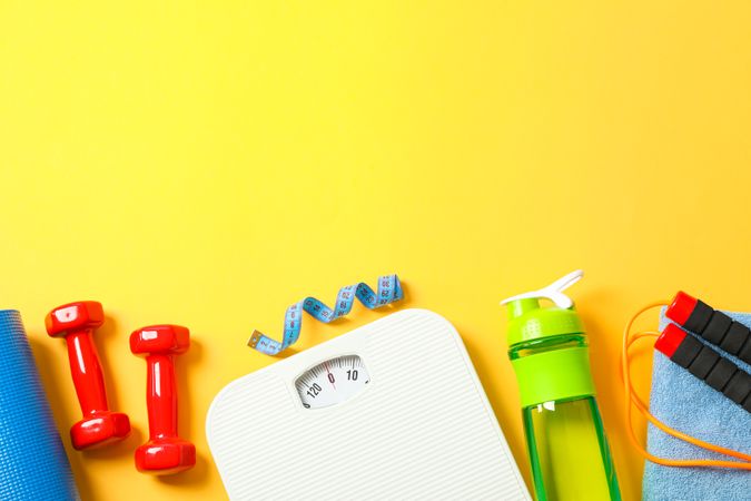 Flat lay composition with loss weigh accessories on color background