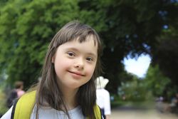 Happy child looking at camera and smiling