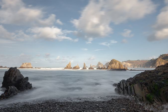 Wonderful ocean rocky coast in fair weather