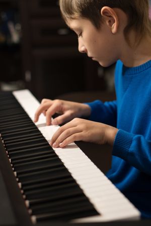 Young Pianist at Practice