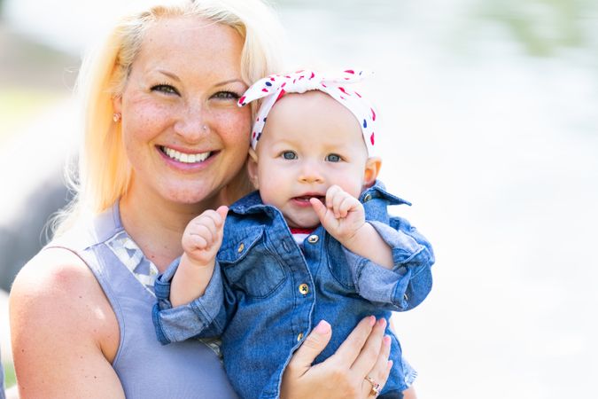 Young Mother and Daughter At The Park