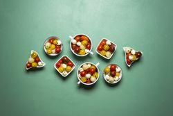 Salad with tomatoes and mozzarella, portions