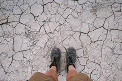 Boots on dry earth