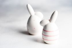 Easter concept with rabbit figurines on table