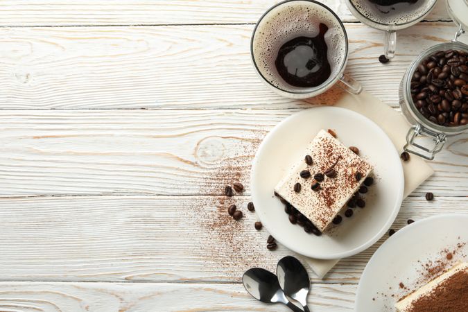 Composition with tasty tiramisu on wooden background. Delicious dessert