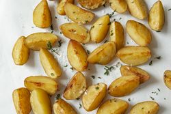 Potato wedges on light close up