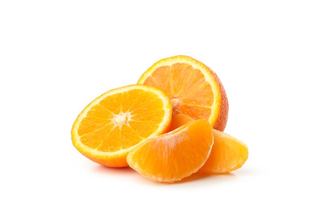 Ripe sweet mandarin isolated on light background