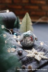 Silver Christmas ornament on textile bEdyA4