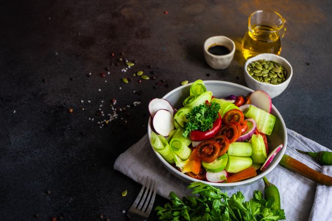 Healthy fresh raw salad with freshly chopped vegetables