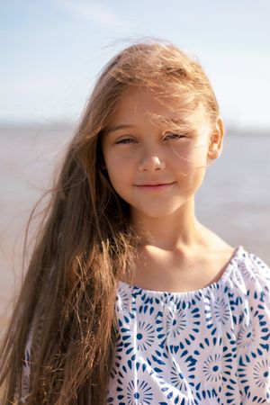 Portrait Adorable child girl with long hair