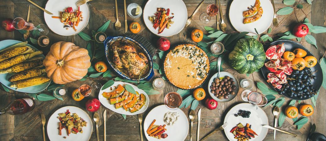 Top view flat lay of Thanksgiving dishes set on rustic table