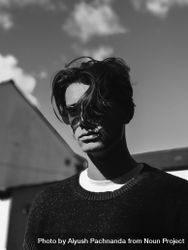 White male model with wavy hair and sunglasses 0gXEX5