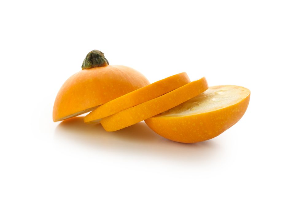 Fresh zucchini slices isolated on blank background