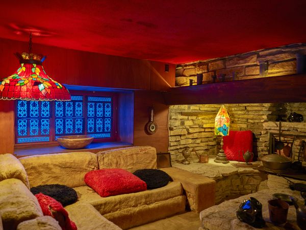 Offbeat room with Tiffany lamps and rock like sofa’s in House on the Rock, Spring Green, Wisconsin