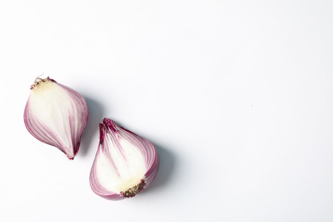 Flat lay composition with red onion on plain background