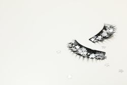 concept of cosmetology tools and beauty treatment, false eyelashes