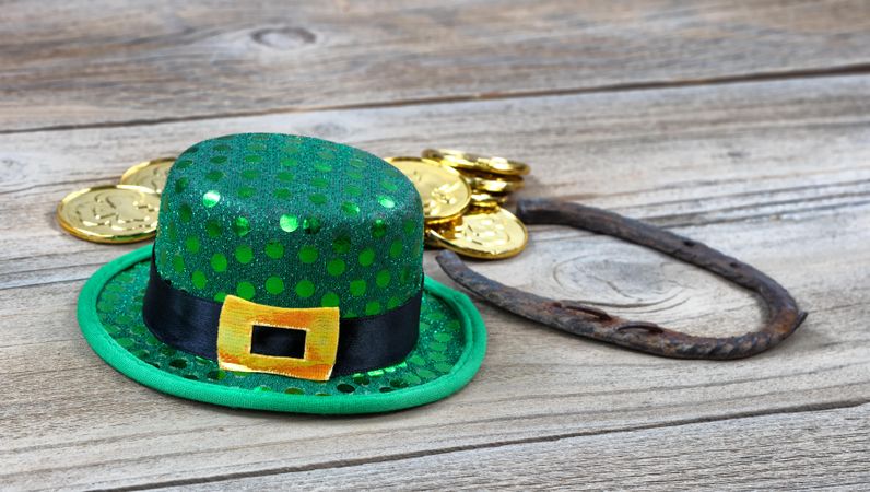 Close up of lucky hat for St Patrick on rustic wood