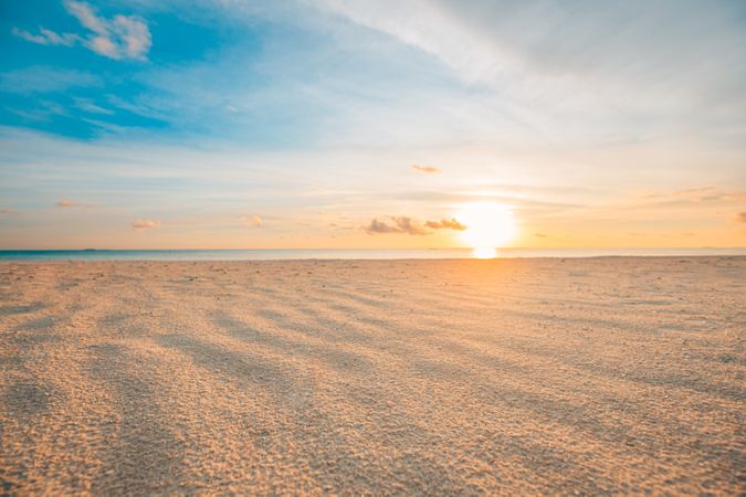 Sun coming down on a quiet beach in the Maldives