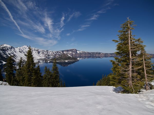 Crystal-clear snowy Crater Lake in Klamath County, Oregon