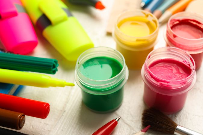 Drawing supplies on wooden background, closeup