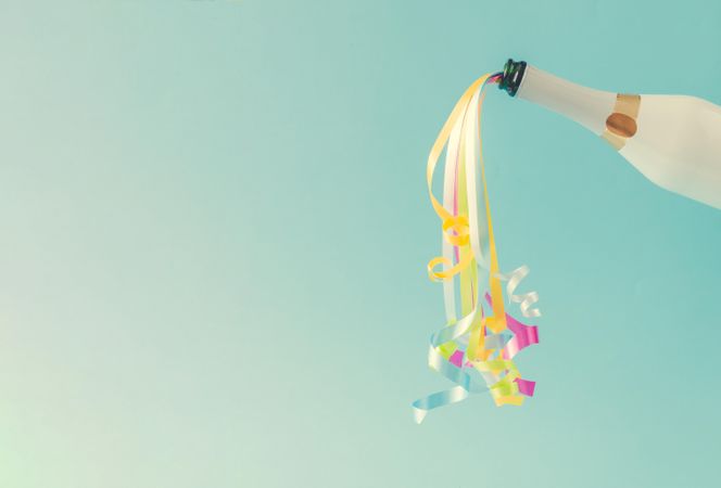 Champagne bottle with party streamers